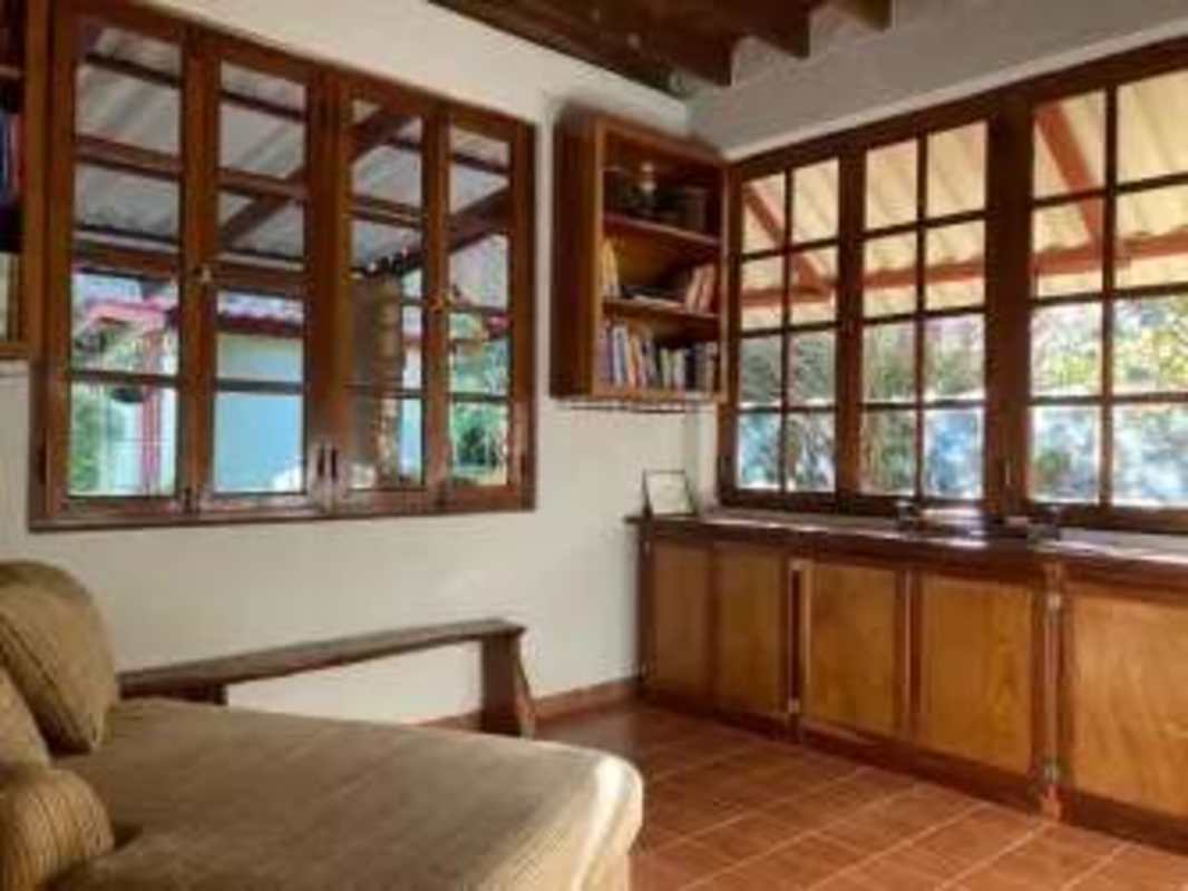 Lake surrounded by forest sunset reflection Cerro Azul mountain community Panama