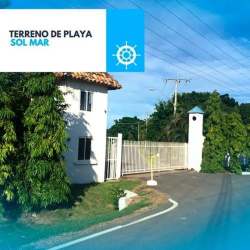 Clear lot with grass and palm trees perfect for building beach home in Sol y Mar complex Panama