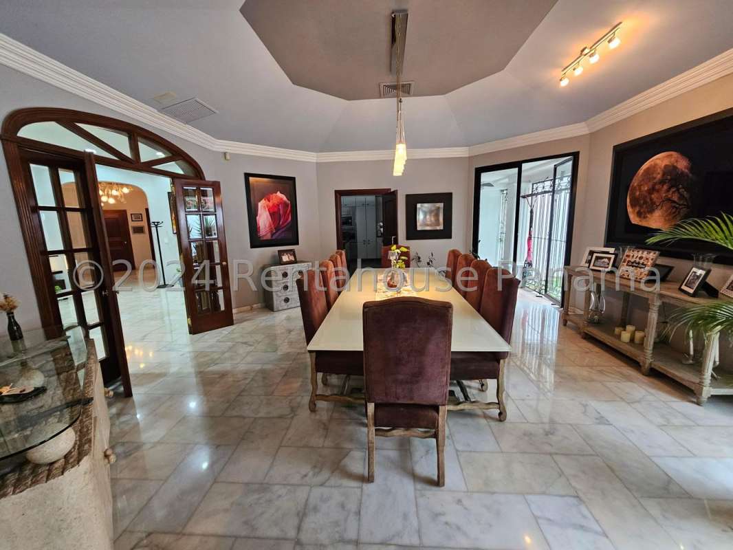 Bright living room with marble floors, luxury furniture in Altos del Golf mansion Panama
