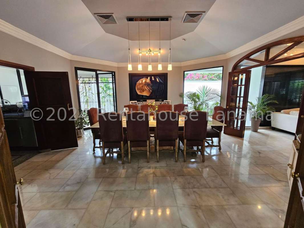 Spacious master bedroom with ensuite bath and garden views Panama luxury house