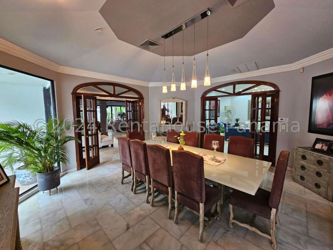 Elegant dining space with seating for 10 marble floors luxury residence Panama