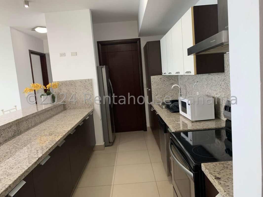 Bedroom with floor-to-ceiling ocean view windows in PH Ocean Club Punta Pacifica Panama