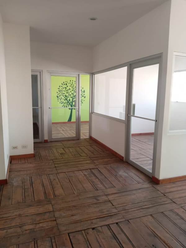 Interior office space on mezzanine level inside industrial warehouse in Villa Belén Tocumen