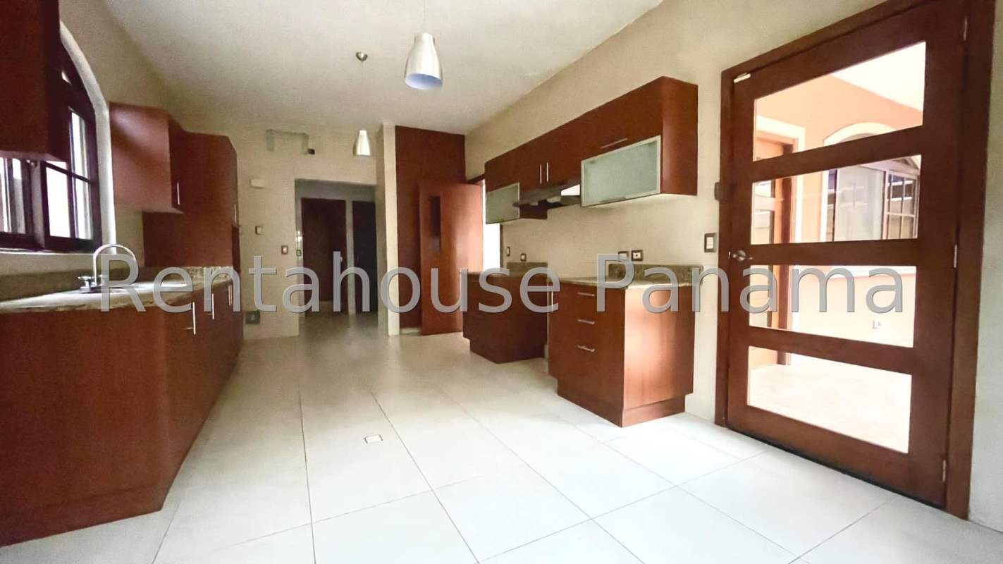 Large living room with tile floors, natural light, Costa Sur Panama house