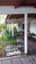 Large covered patio terrace overlooking Pacific Ocean at Playa Corona beachfront estate