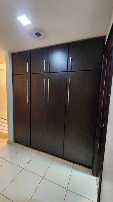 Interior staircase with metal railings and art pieces Limajo Panama