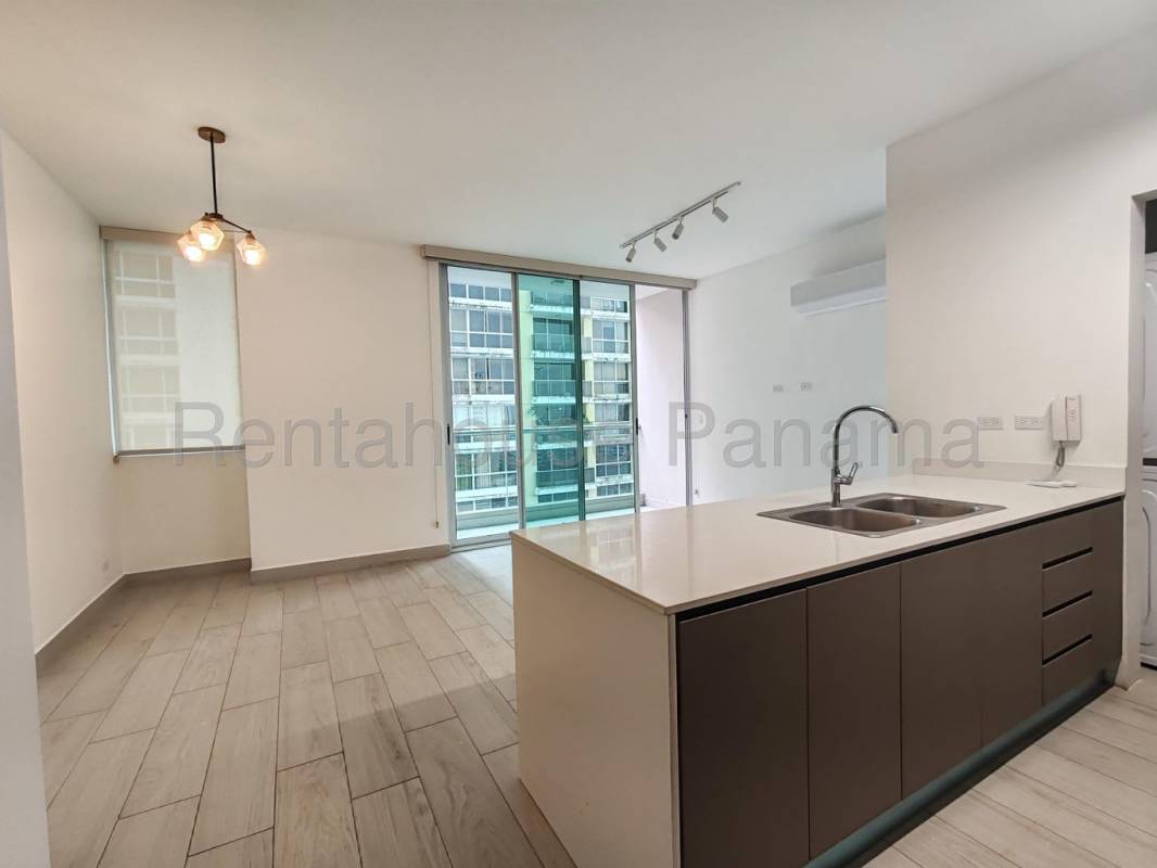 Bright open living dining area with balcony access in PH Urbana Obarrio Panama City