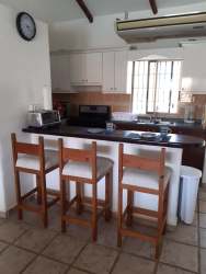 Comfortable master bedroom with AC, fan, natural light in Coronado vacation villa