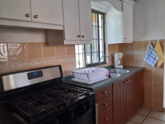 Private guest room with air conditioning and en-suite bathroom in Coronado holiday house