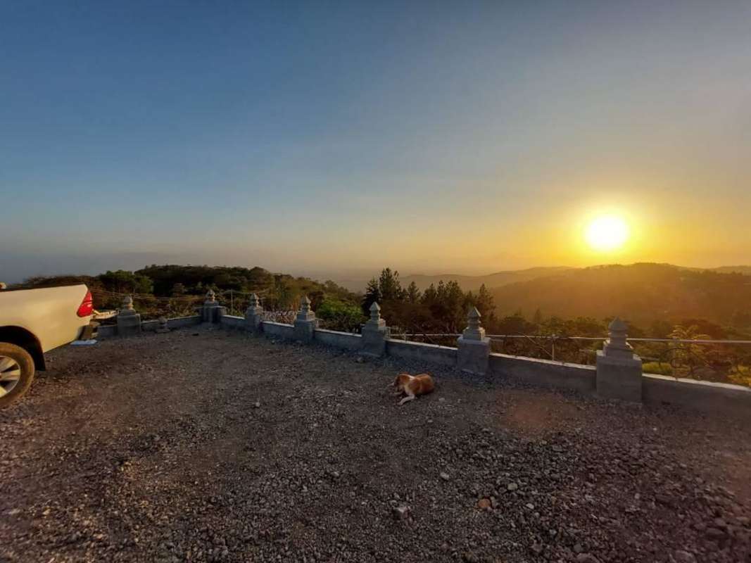 Outdoor hill slope with stone fence and pickup truck Cerro Azul Panama