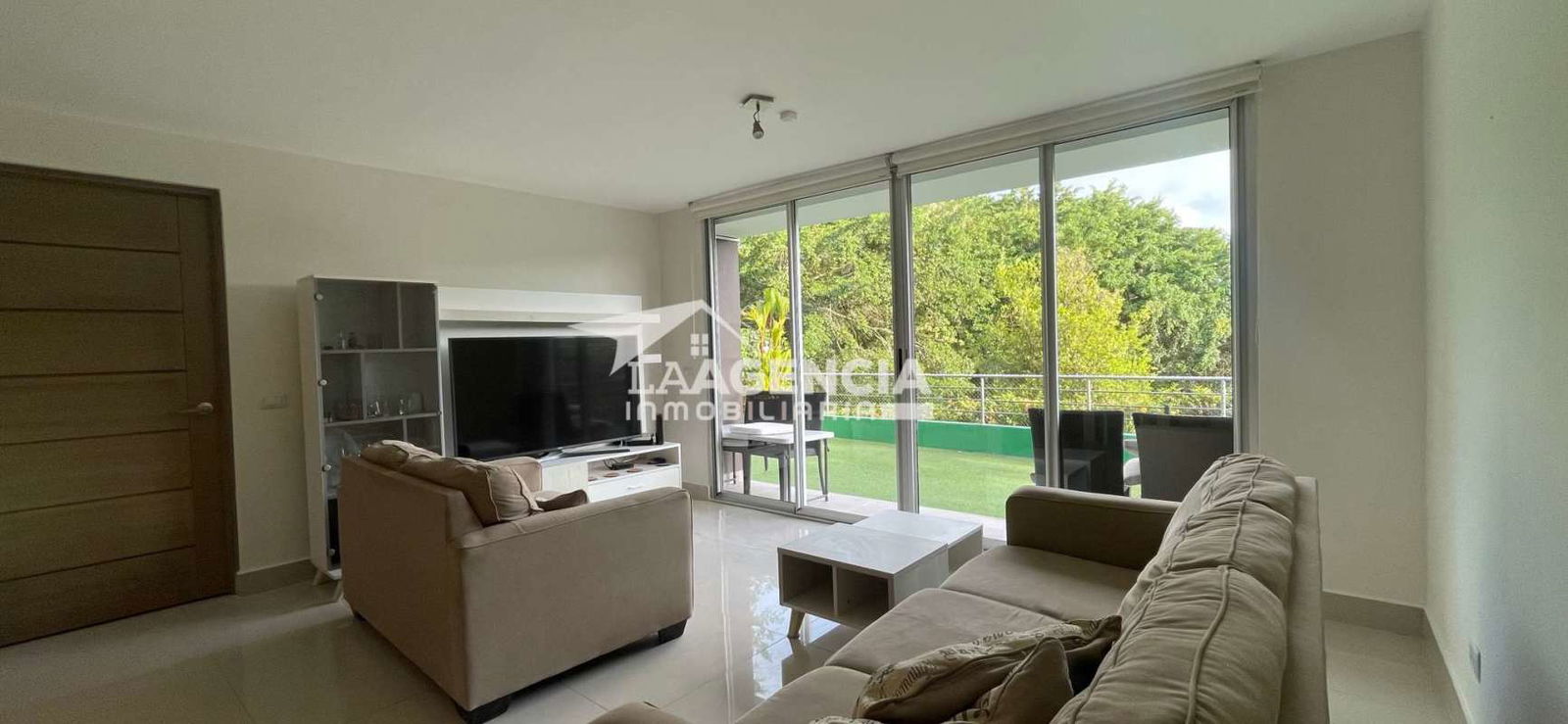 Large private terrace with artificial lawn and garden view Clayton Hill Residences Panama