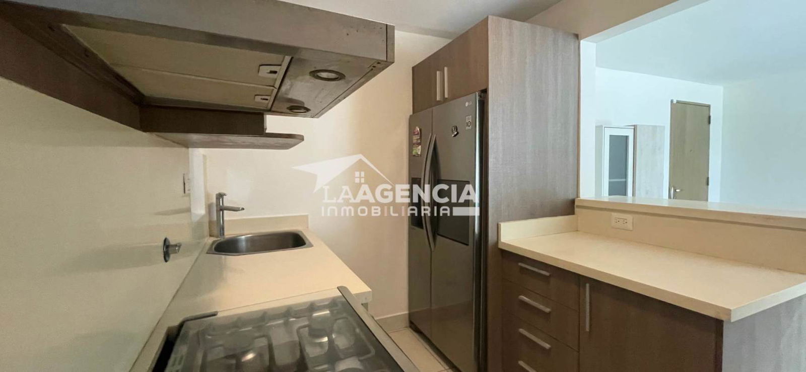 Fully equipped kitchen featuring pass-through window and appliances Clayton Panama
