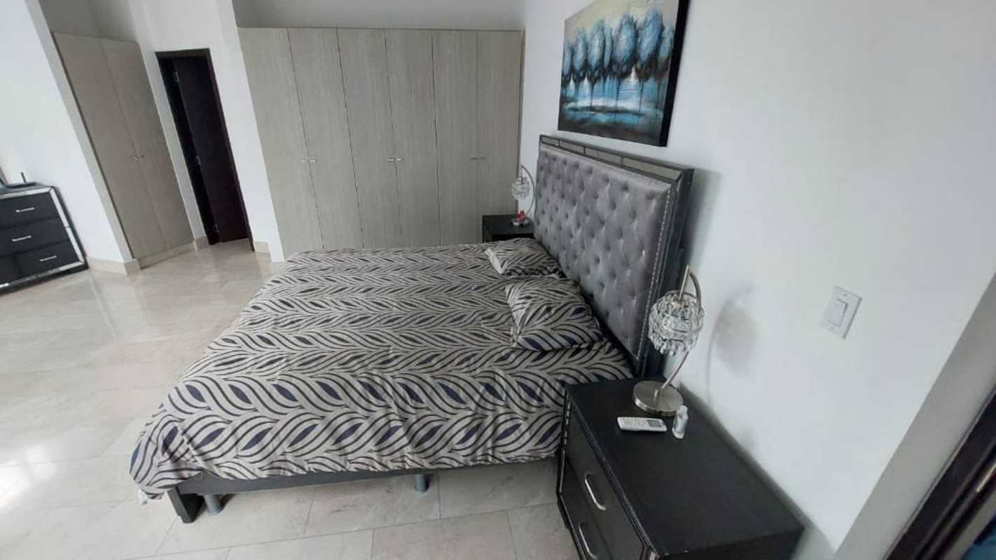 Contemporary hallway space with ocean views and floor-to-ceiling windows at Grand Tower Punta Pacifica