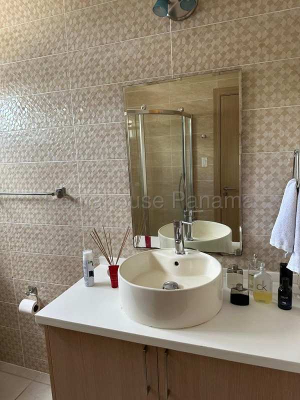 Covered outdoor terrace and patio garden with potted plants privacy fence PH Victoria Brisas del Golf Panama