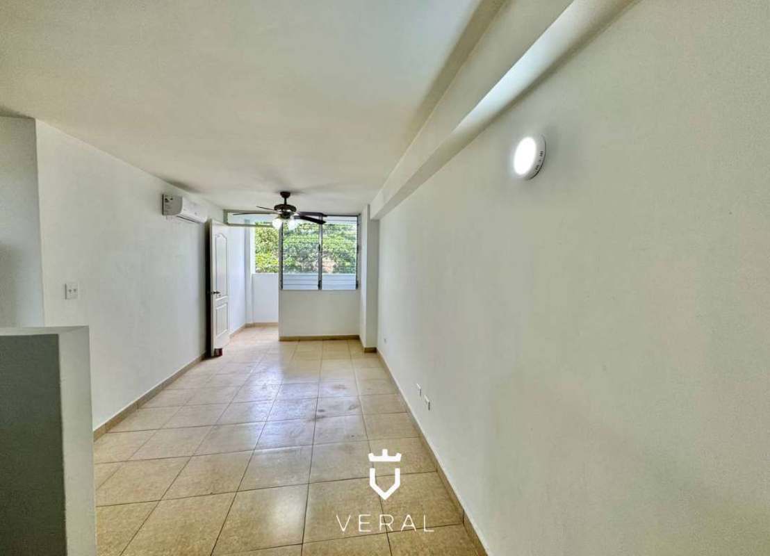 Bedroom with marble floors, split AC and large windows with greenery view PH Bella Vista Gardens Panama