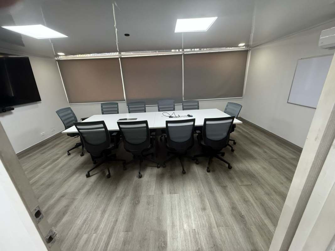 Modern conference room with table TV whiteboard in Juan Diaz industrial office Panama