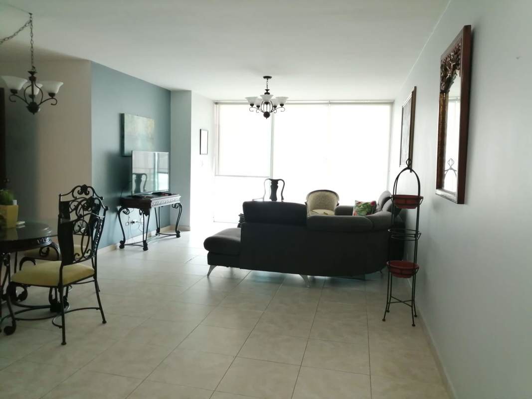 Modern Emporium Tower facade with palm trees in San Francisco Panama