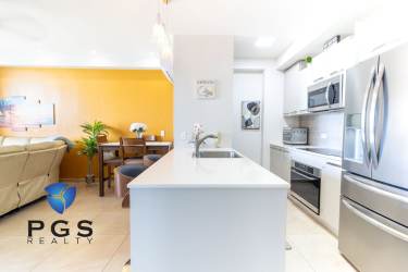 Bright bedroom with ocean views, AC and fan at Royal Palm Gorgona Panama