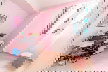 Bathroom with walk-in shower, window, vanity in Royal Palm Playa Gorgona condo