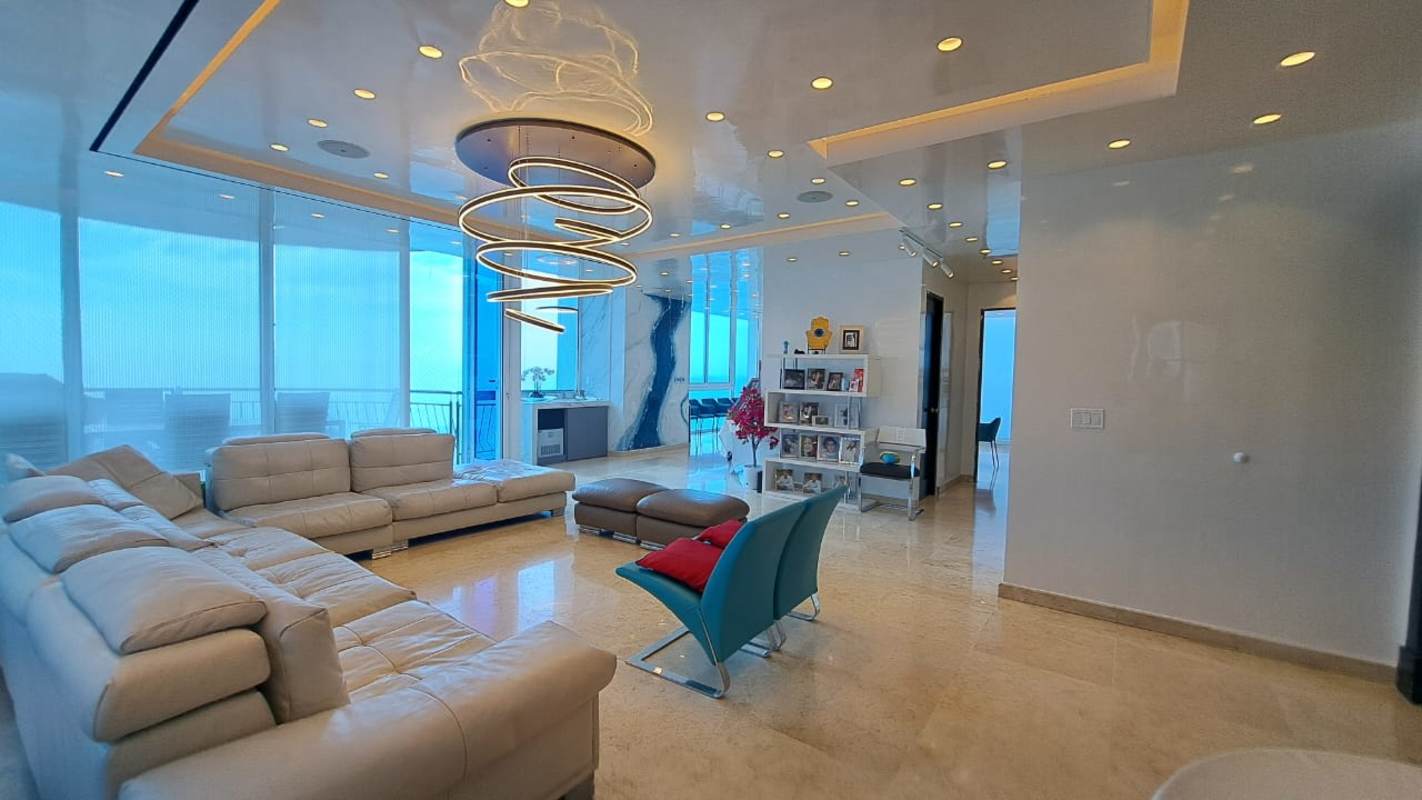 Huge updated kitchen with granite countertops, island seating, stainless appliances, ocean view windows at PH Vista Sol Paitilla Panama