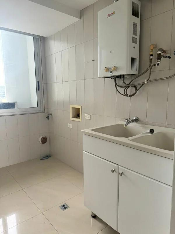 Modern high-rise residential tower PH Elevation Tower with balconies city skyline Costa del Este Panama