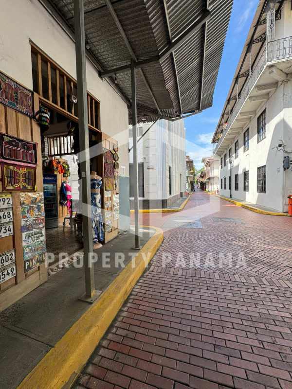 Storefront commercial retail property on historic cobblestone street Casco Viejo