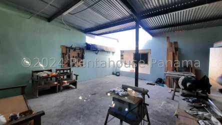Modernized bathroom with granite countertop vanity and tiled shower in Vacamonte house