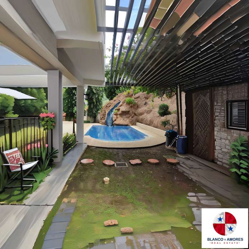 Covered terrace with bar and BBQ next to private pool house for sale Panama