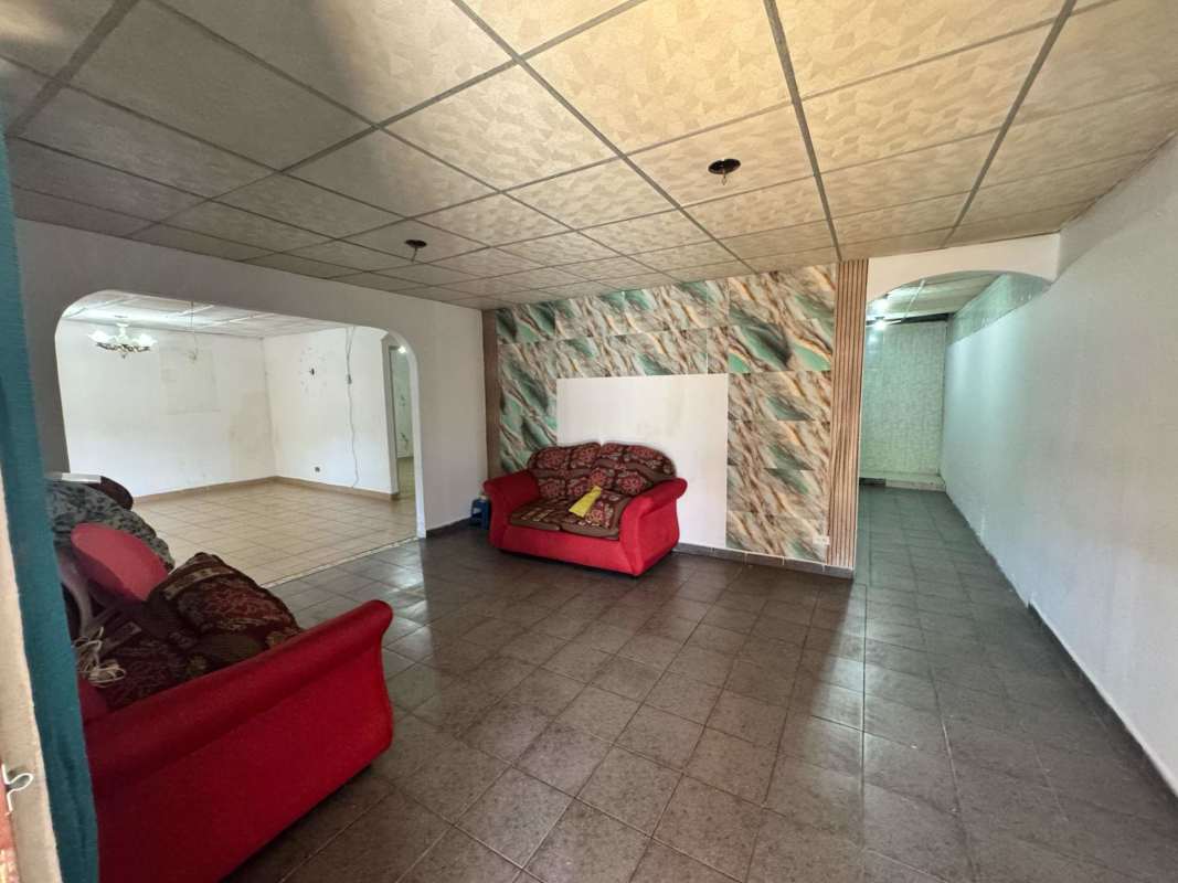 Bedroom area with tile floor, built-in closet space Don Bosco Los Caobos Panama City