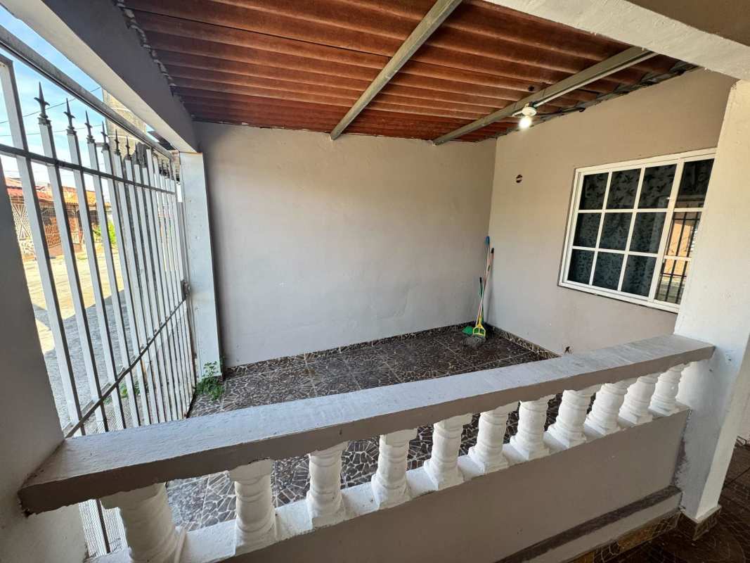 Basic tiled kitchen with wooden cabinets and sink area Don Bosco Los Caobos Panama City