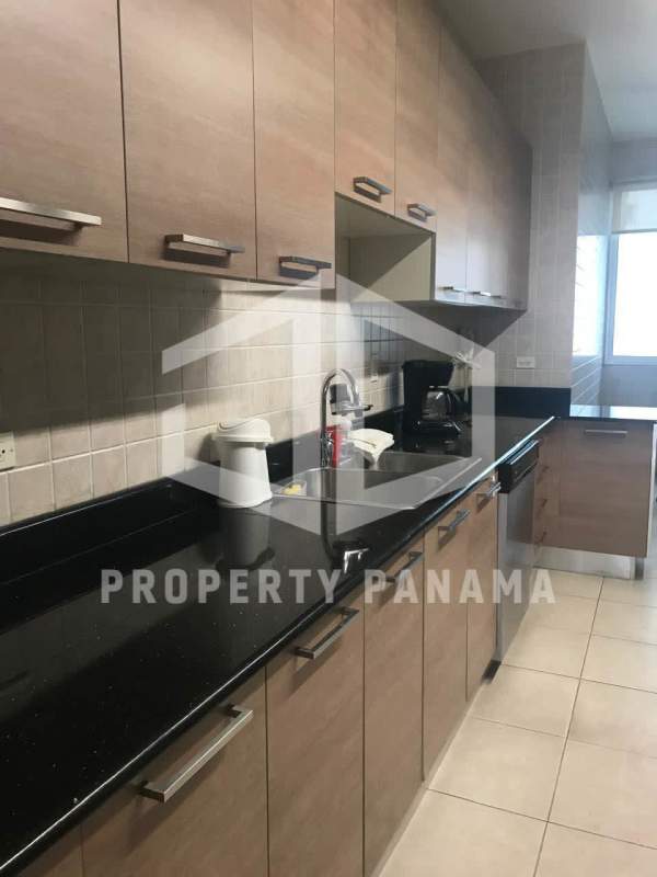 Bright living room with ocean views and large floor-to-ceiling windows Punta Pacifica Panama