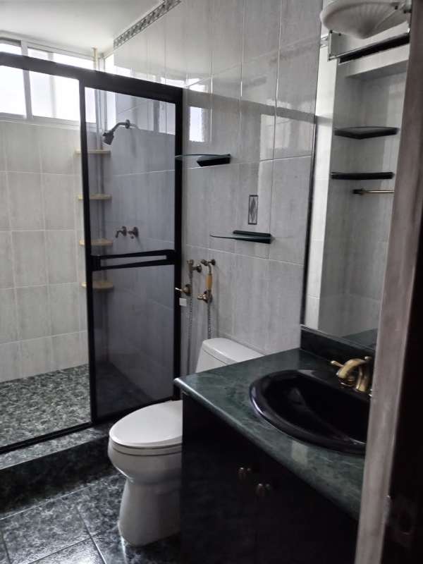 Bright traditional bedroom with built-in closets and large window in PH Montecarlo Panama City