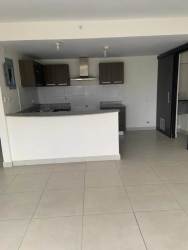 Spacious master bedroom with tile floor, window, closet PH Midrise Panama Pacifico