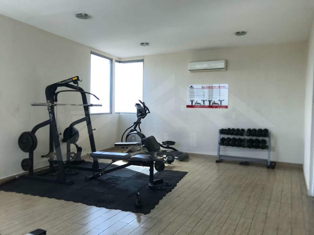 Fully equipped gym with cardio and weights in PH Villa de las Fuentes Panama City apartment building