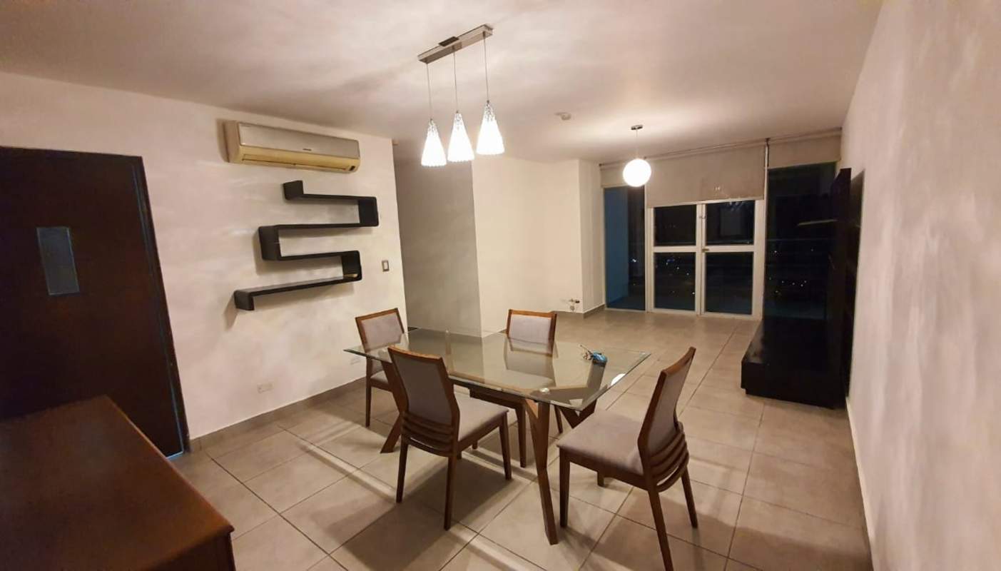 Bedroom with floor-to-ceiling windows and night skyline view in Crystal Hills Panama