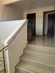 Contemporary kitchen with granite counters, stainless appliances at Sunset Hill Costa Verde Panama