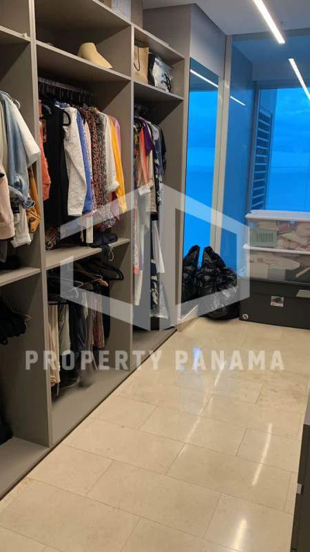 Spacious master bedroom with panoramic window ocean view in PH Pacific Village Punta Pacífica Panama