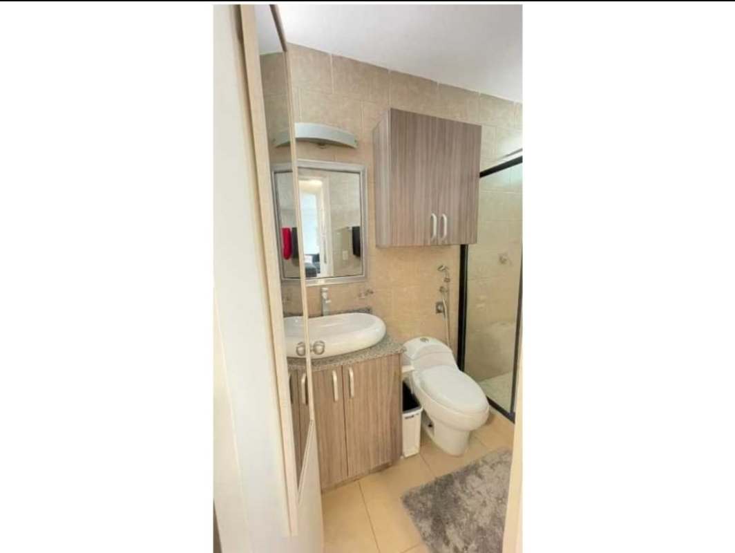 Contemporary bathroom with granite sink and glass shower PH Red Point