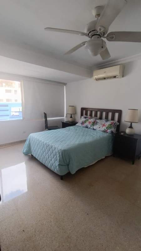 Contemporary galley kitchen with appliances and glass cabinets in PH Ipanema Panama