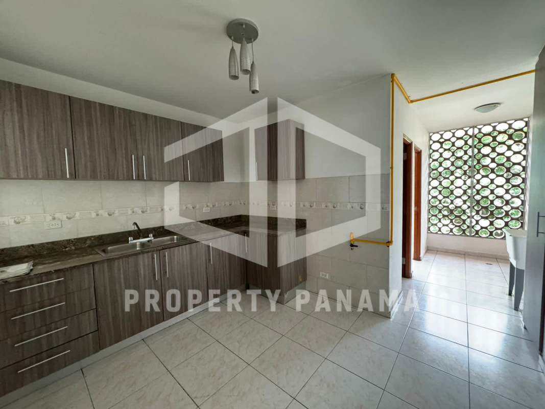 Functional kitchen wood cabinets backsplash ventilation screen PH Deveaux San Francisco Panama