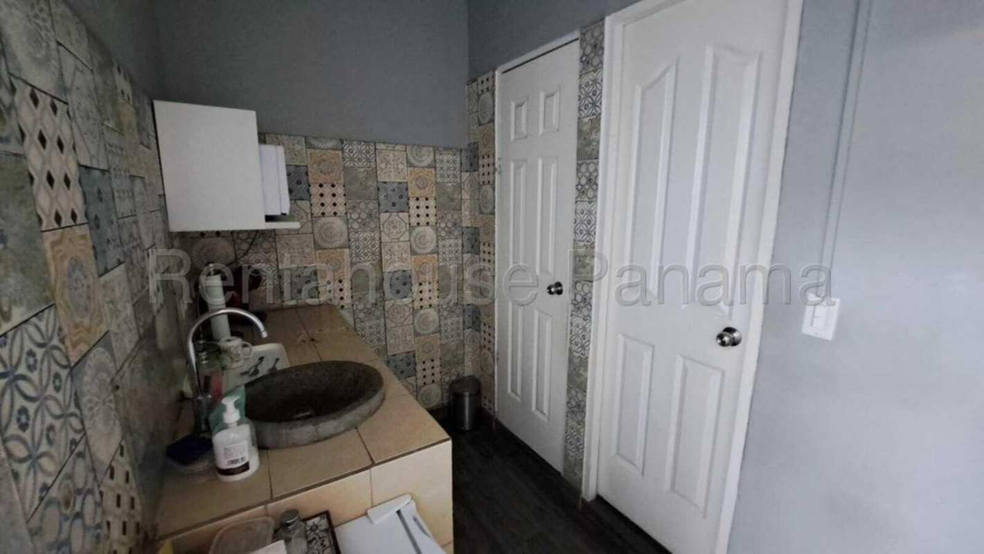 Bathroom with decorative tile wall in PH San Francisco commercial space