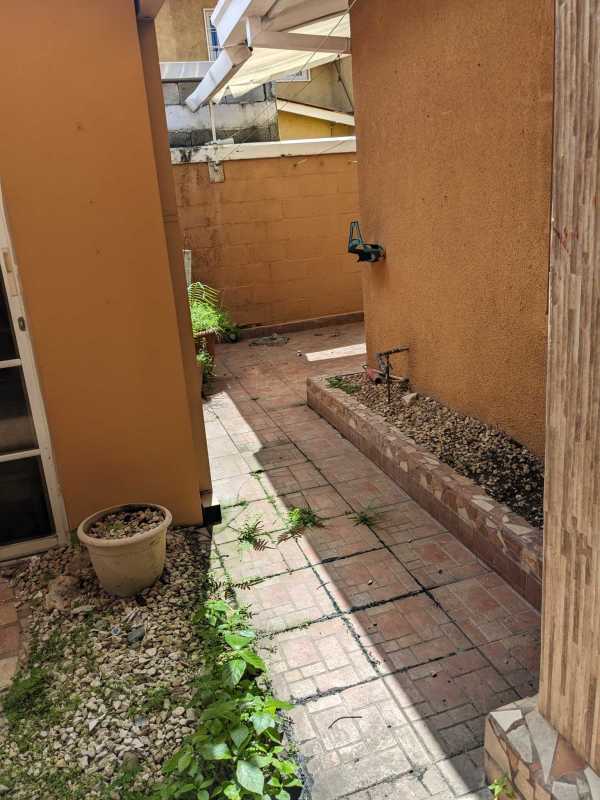 Small courtyard garden patio view from inside house Dorado Lakes Panama