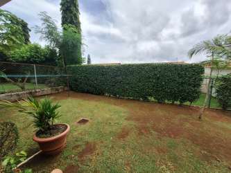 House front entrance and covered carport at La Arboleda Costa Verde Panama