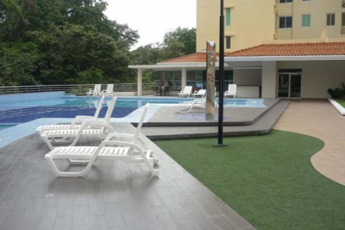 Outdoor pool with sundeck and lounge at PH Clayton Park Panama