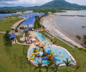 Aerial oceanfront Playa Dorada condos, pools, water park, Panama Oeste