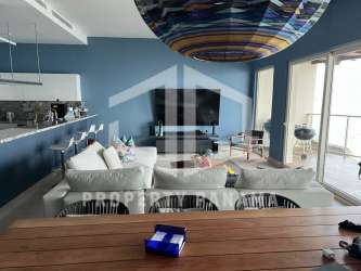 Dining area with ocean views and terrace access in beachfront PH Playa Escondida Panama