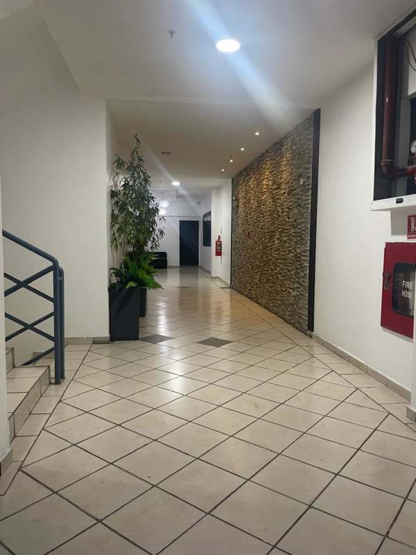 Entrance lobby elevator access with modern finishes in PH Plaza Valencia Carrasquilla Panama