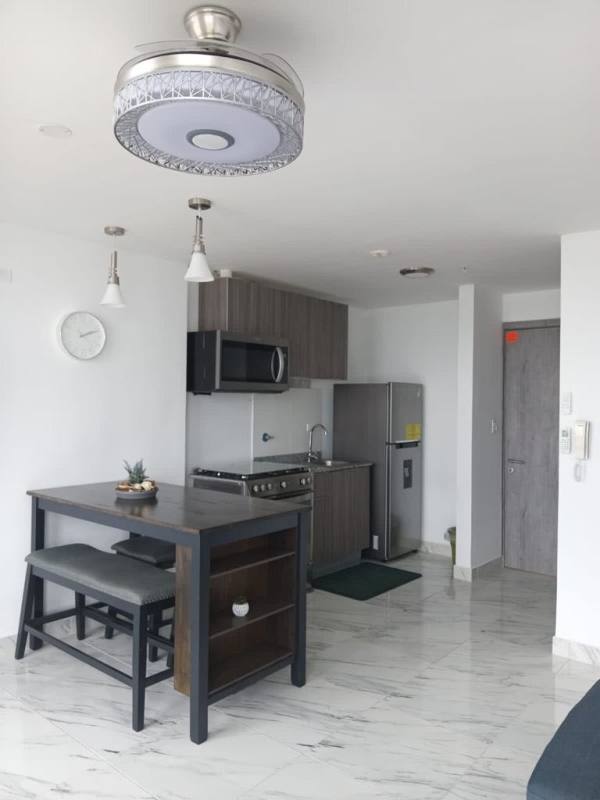 Modern minimalist living room open to balcony with ocean view at PH The Sands Avenida Balboa Panama