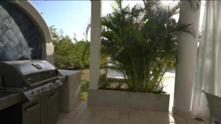 Luxury bathroom with marble double vanity, glass shower and soaking tub in Buenaventura Panama villa