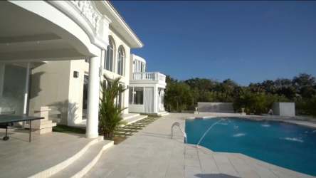 Open concept living area with pool access in luxury villa Buenaventura Panama